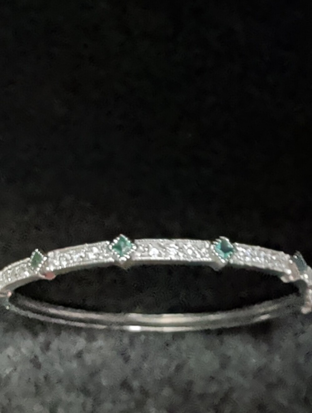 Elegant Silver Bracelet with Green Gem Accents